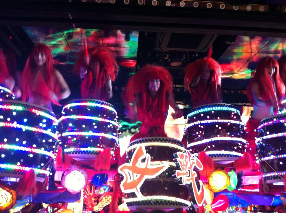 Robot Restaurant drummers with red wigs